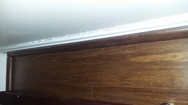 Baseboard pulled away from wall!