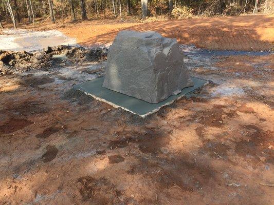 Standard insulated rock cover installed over new well!