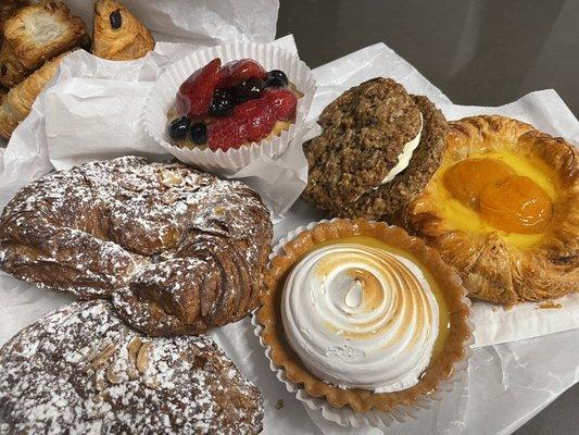 Lemon meringue, apricot danish, almond croissants, fruit tart- all so delicious!