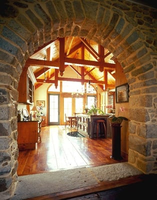 Timber framed trusses set behind a stone arch - Maryland