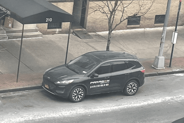 Paragon Security would routinely park their branded cars outside of the East facing window of my apt as a means of intimidation.