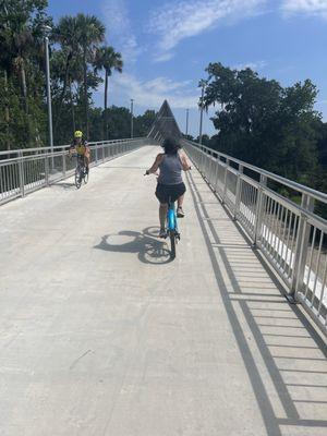 Crossing the new pedestrian bridge over SR 100 on a rental eBike.