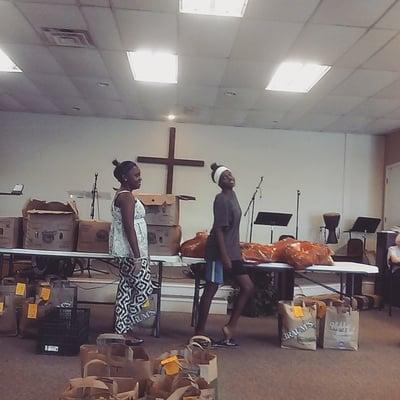 Me and my sis helping feed people at church