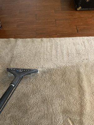 Before and after cleaning a living room carpet restoring it back to new