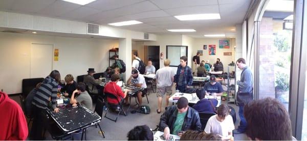 The back room for the Pre-release tournament of Return to Ravinca.