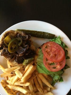 Turkey burger with mushrooms and jalapeños. Side of fries