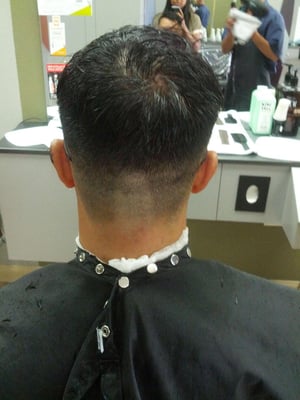 Read my review which explains this picture. Worst haircut ever! But "fixed" by another employee