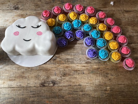 Cloud cake with rainbow cupcakes