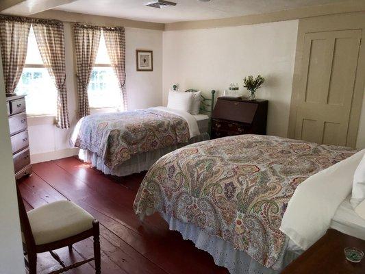 Room 2 overlooks the stone patio and perennial garden