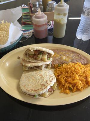 Picadillo with flour tortillas rice and beans