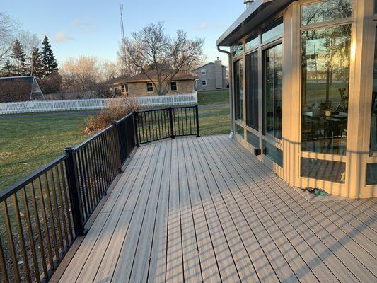 Deck attached to sunroom - happy with the blend.