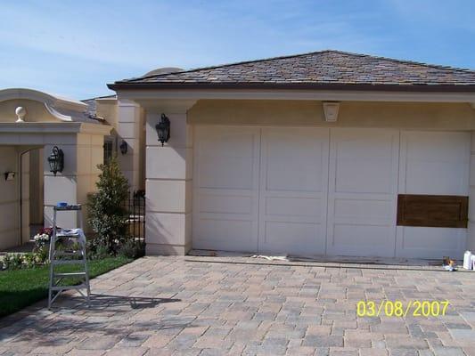 San Clemente: Primed white wood door fauxed to look like stain