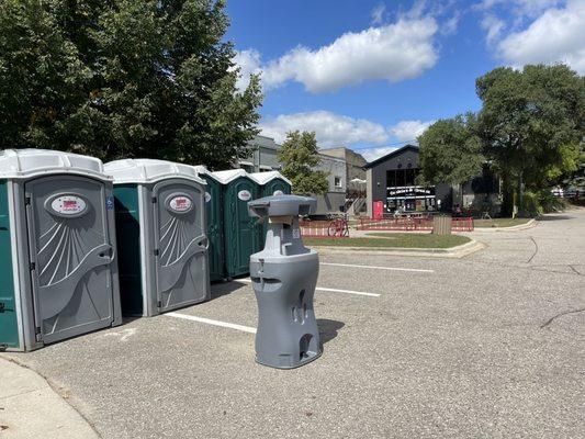 Porta-potties OR the fire station for bathrooms