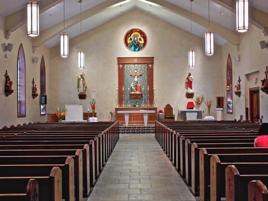 Installed Our Lady of Perpetual Help five-foot round stained/leaded glass window above altar in Newry, PA.