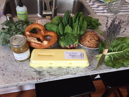 Here is our haul from opening day. Not pictured: Finn's Biscuits (in our bellies). (PS the soap just photobombed.)