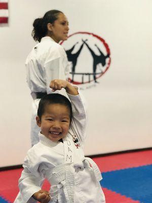 Our amazing 5 years old Adam Chen is happy while he is learning his high blocks !!!