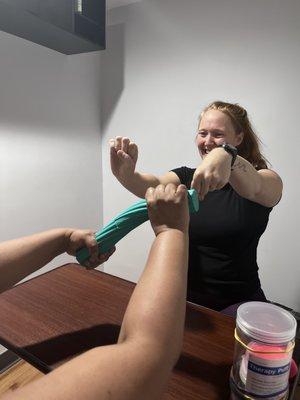 Occupational Therapist working with patient of wrist mobility