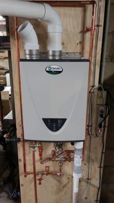 Tankless Hot water heater 98.7% efficiency.