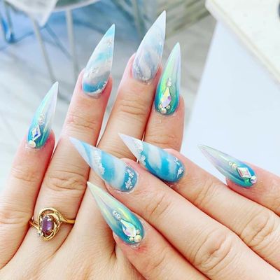 Full set of acrylic stiletto marble nails