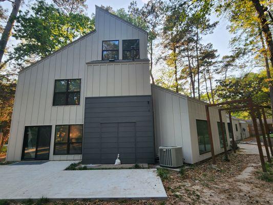 New siding, back of home. All coated with Sherwin Williams paint