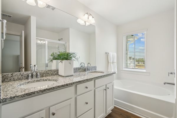 Bathroom featuring shower and garden tub