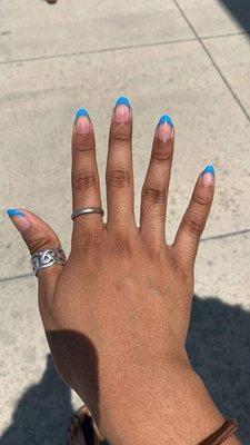 Gel manicure with blue French tips