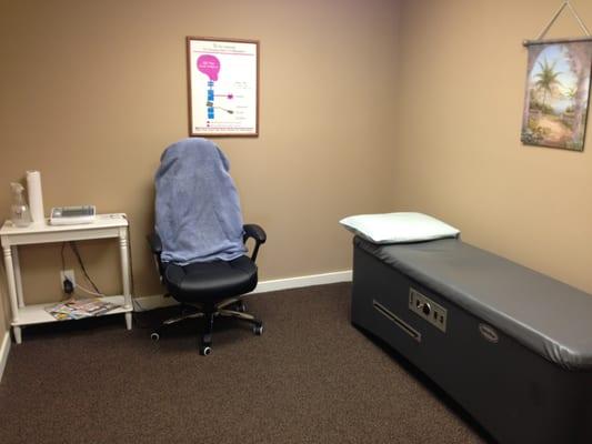 Rolling massage bed and seated electric stimulation room