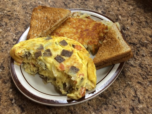 Greek omelette with hash browns and toast