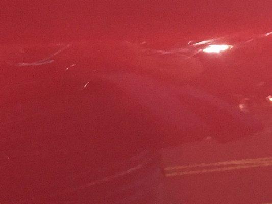 See the scuffing marks on my car - Seems like another door was slammed on it.