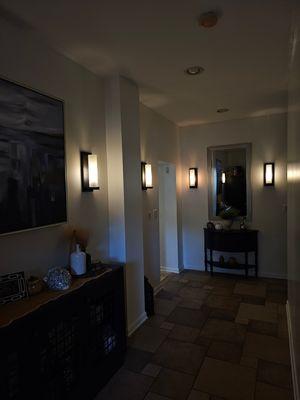 Added ambience with a dimmer to Homeowners foyer.