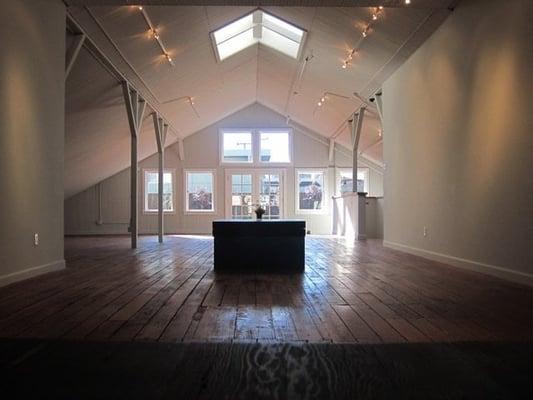 upstairs gallery facing rooftop garden, perfect spot for special event