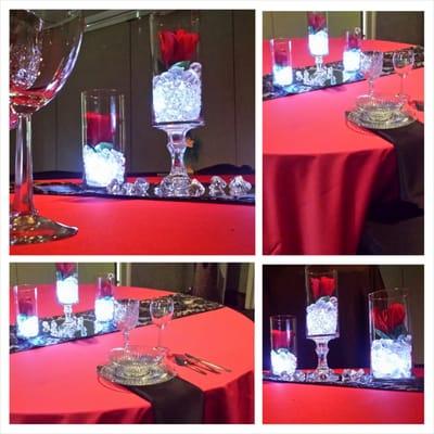 Red lamour tablecloths, black sequin table runner, and centerpieces all from AZ Rents talented staff