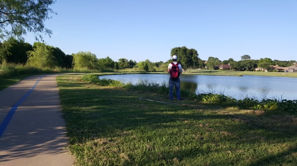 Bike trail meandering along various small ponds.