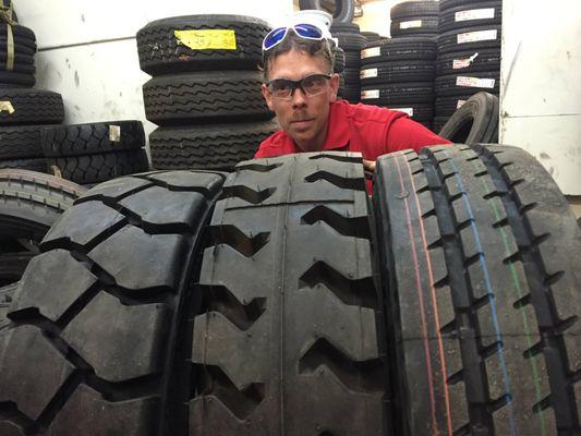 Tire repair materials as Jason inspects for issues.