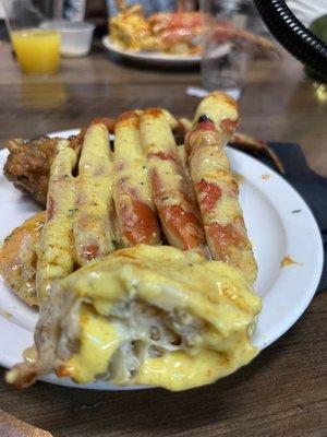 Garlic crab legs in garlic butter .