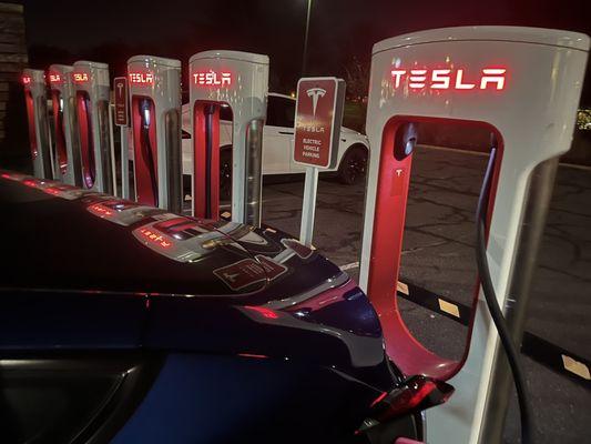 Bank of 6 Tesla Superchargers at this location