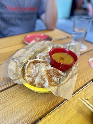 Roti and curry sauce. Curry sauce was delish!!