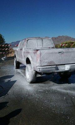 Foaming a dirty truck.