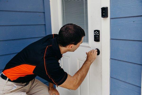 Installing high security locks for a house.