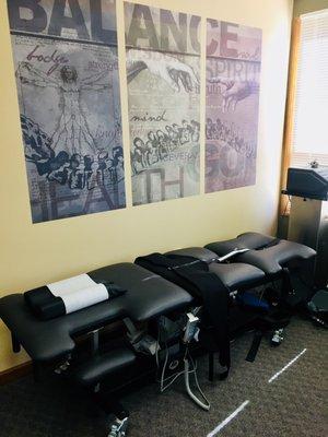 Our decompression therapy table, in our fully equipped exercise therapy room.