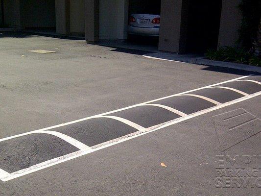 Parking lot striping and wheels stop professional installed.