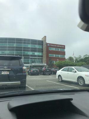 Entrance to 900 Warren Ave is all the way around both buildings, in the WAY back.