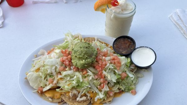 Nachos. good portion but use a cheese "sauce"