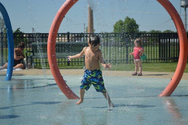 Cool off in the summer at the Central Park Spray Pad.