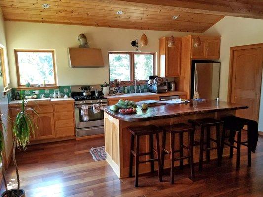 Alder cabinets, butcher block countertops, walnut slab countertop