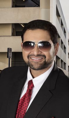 Azim Presswala, DDS