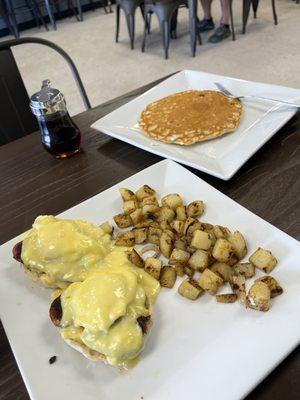 Eggs Benny with a banana pancake on the side.