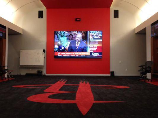 Houston Rockets locker room, custom designed and installed video wall with sound system, controlled by Savant.