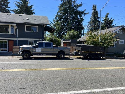 Construction debris removal and delivery of new building materials for the contractor