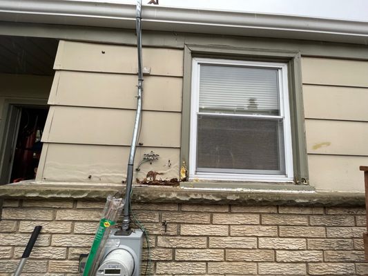 Rotted window trim & siding